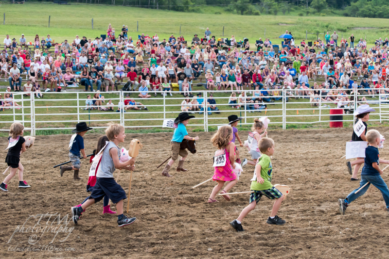 Kids in a stick horse race at the Ellicottville Rodeo!