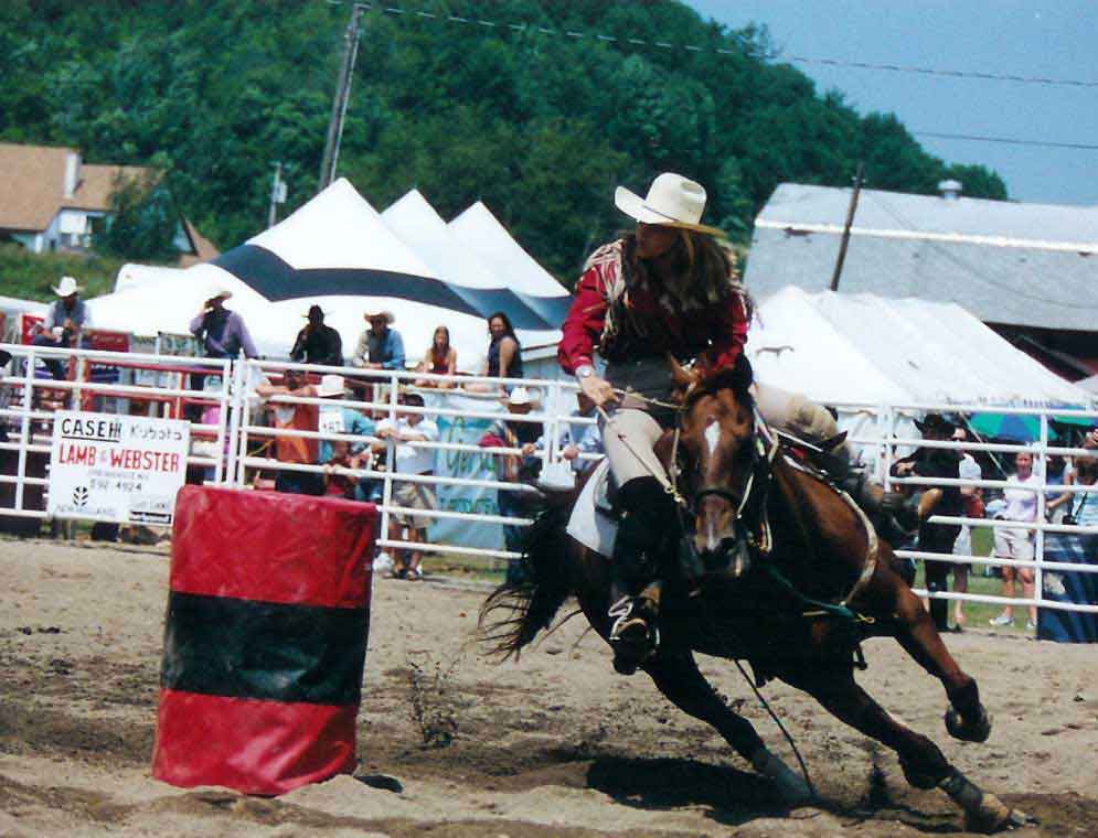 Cowgirls Barrel Racing At The Ellicottville Rodeo